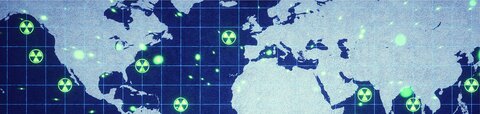 World map with nuclear warning logos throughout